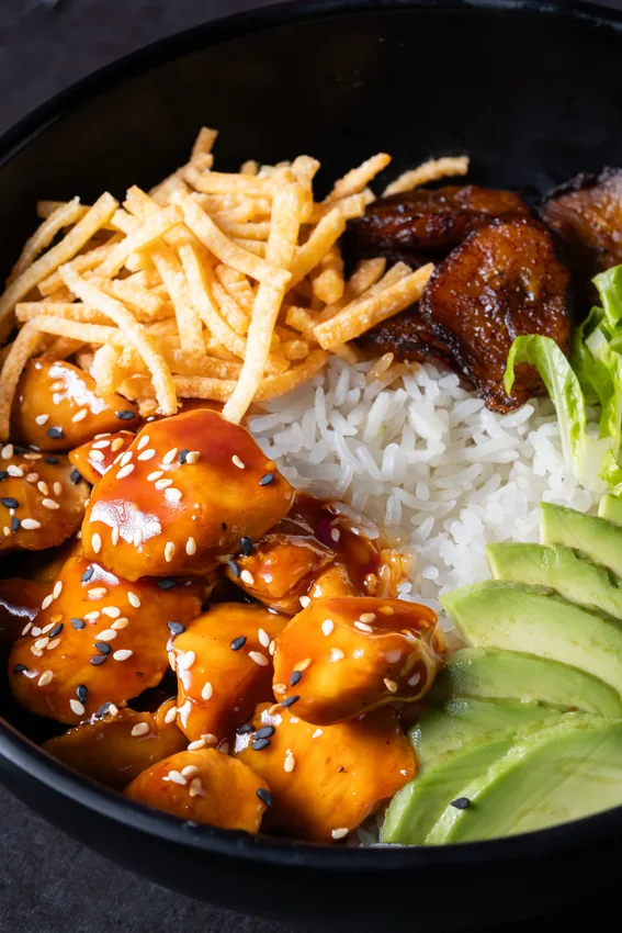 Wok rice bowl with chicken and avocado